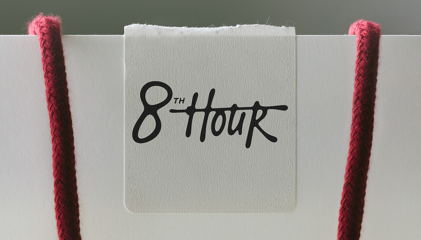 8th Hour branding shopping bag and wordmark label detail