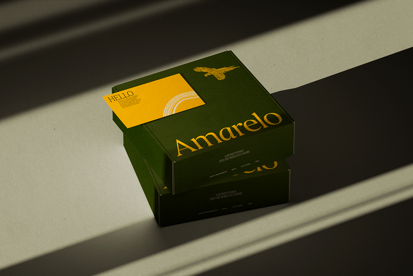 Amarelo Beverages branding green packaging boxes and yellow note card