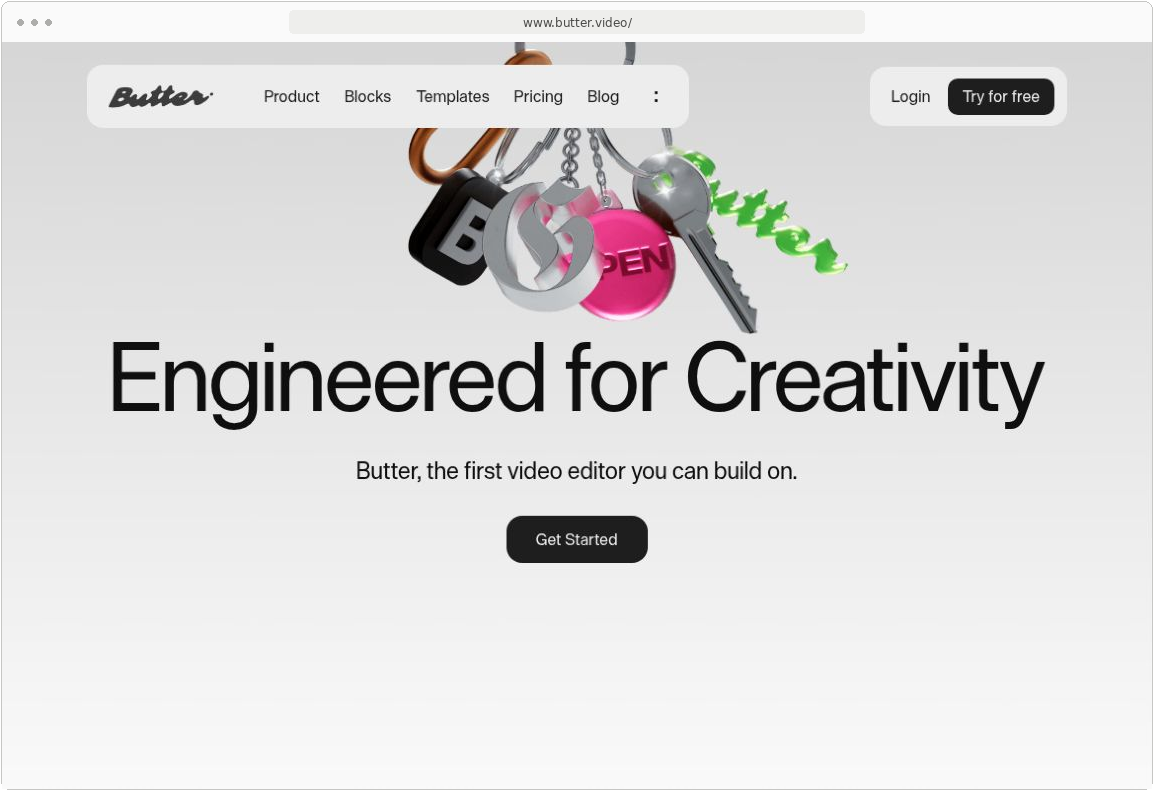 Butter homepage with oversized black type, colorful keychain artwork and rounded navigation