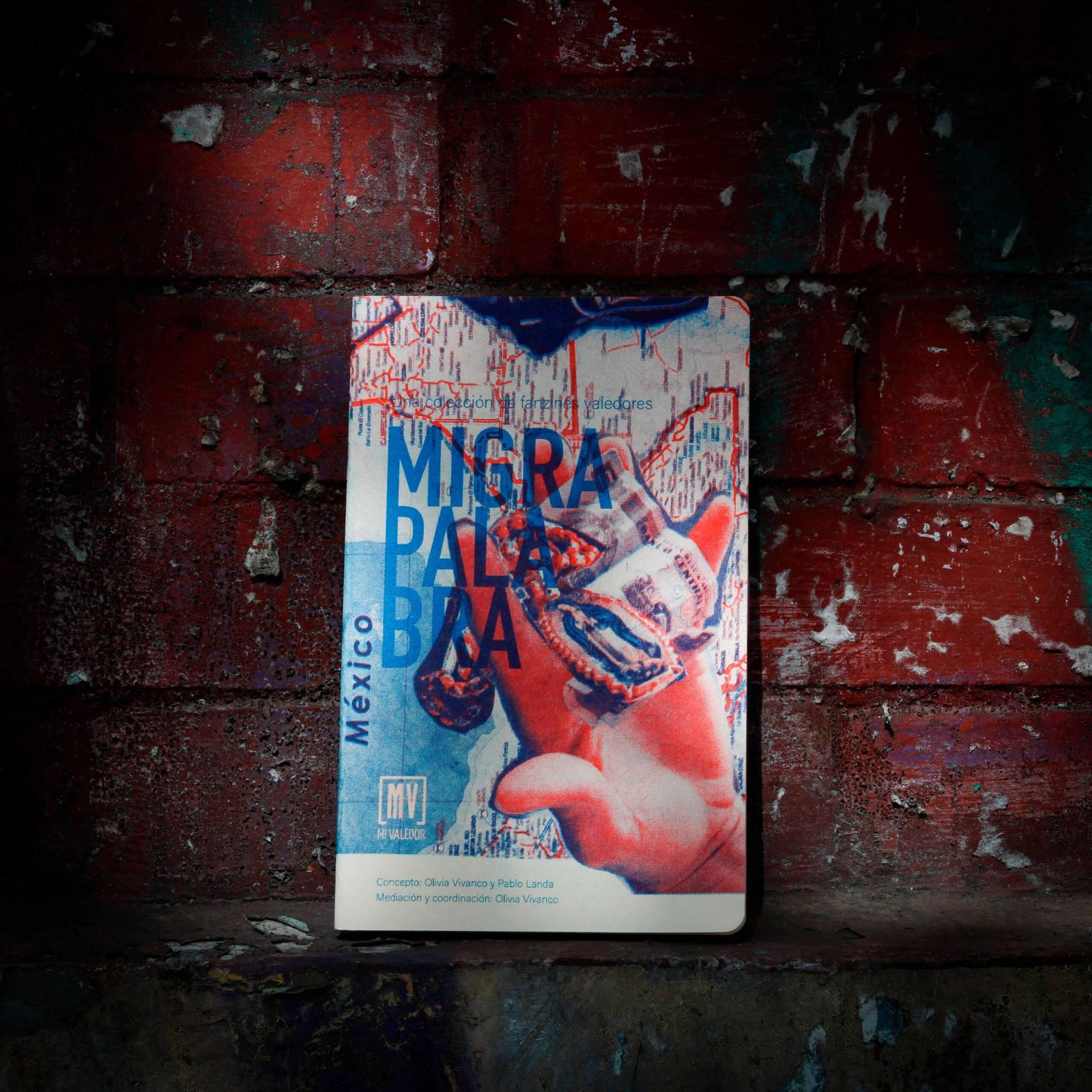 Fanzine 'MigraPalabra' vol. 5 cover with blue condensed type over red and blue duotone imagery