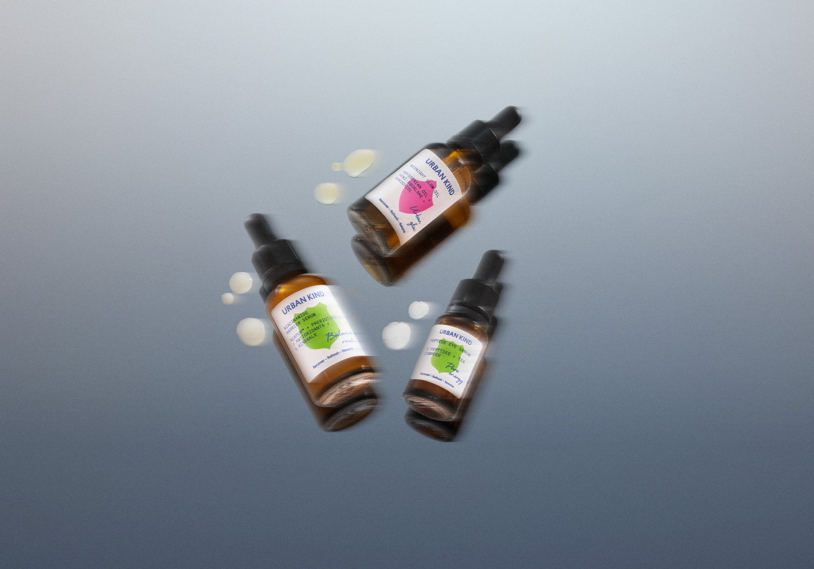 Urban Kind serum bottles with shield labels by Everland