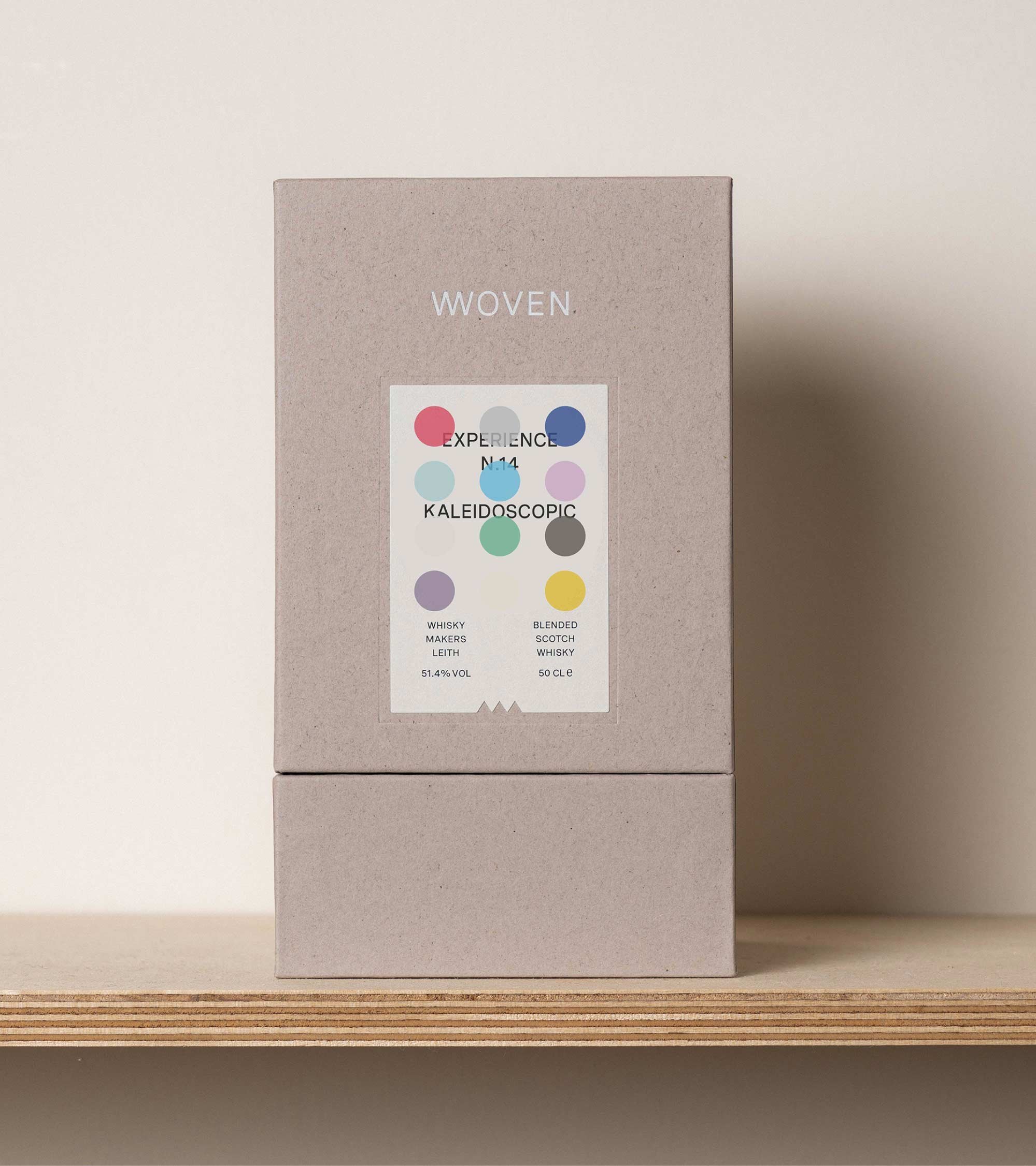 Grey Woven gift box for Experience N.14 Kaleidoscopic, with a colored dot grid label.