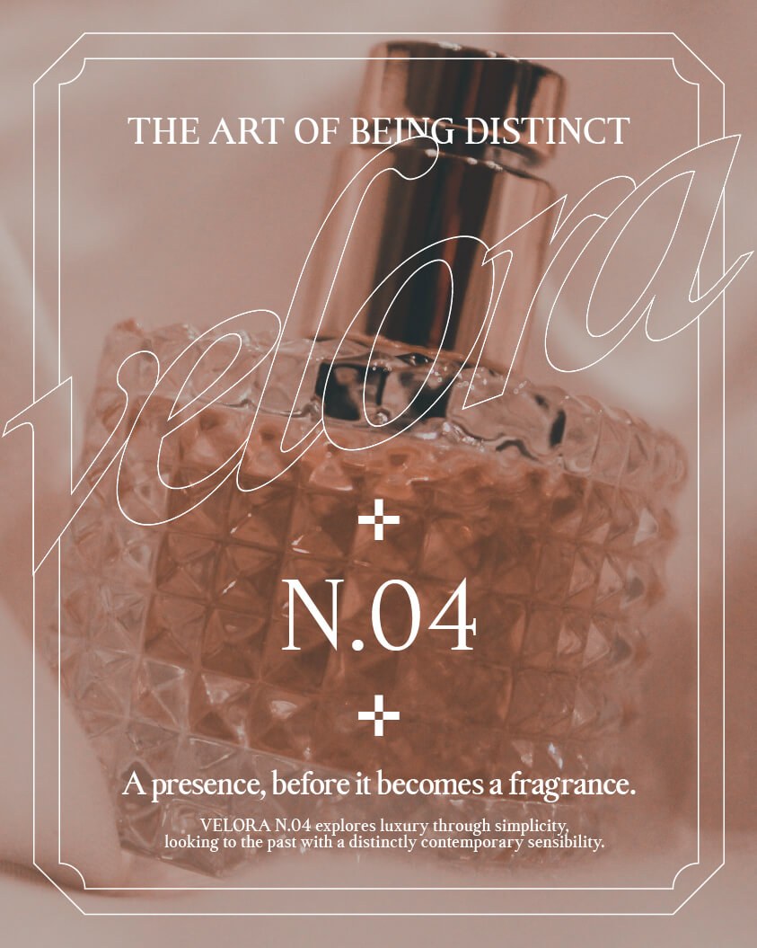 Outlined Michelangelus script spelling velora on the Velora N.04 fragrance ad mockup