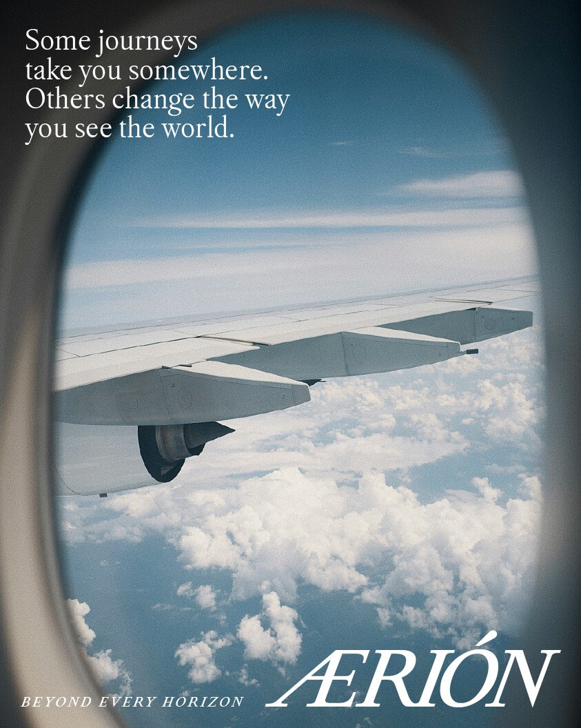Michelangelus set in an Aerión airline ad mockup viewed through an airplane window