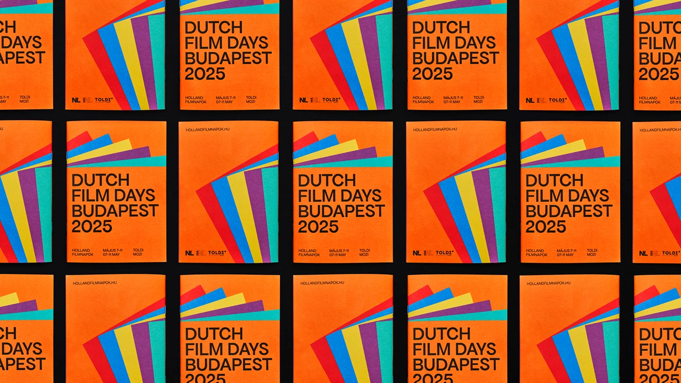 Printed collateral spread showing the six-color palette system across multiple formats — Dutch Film Days festival branding