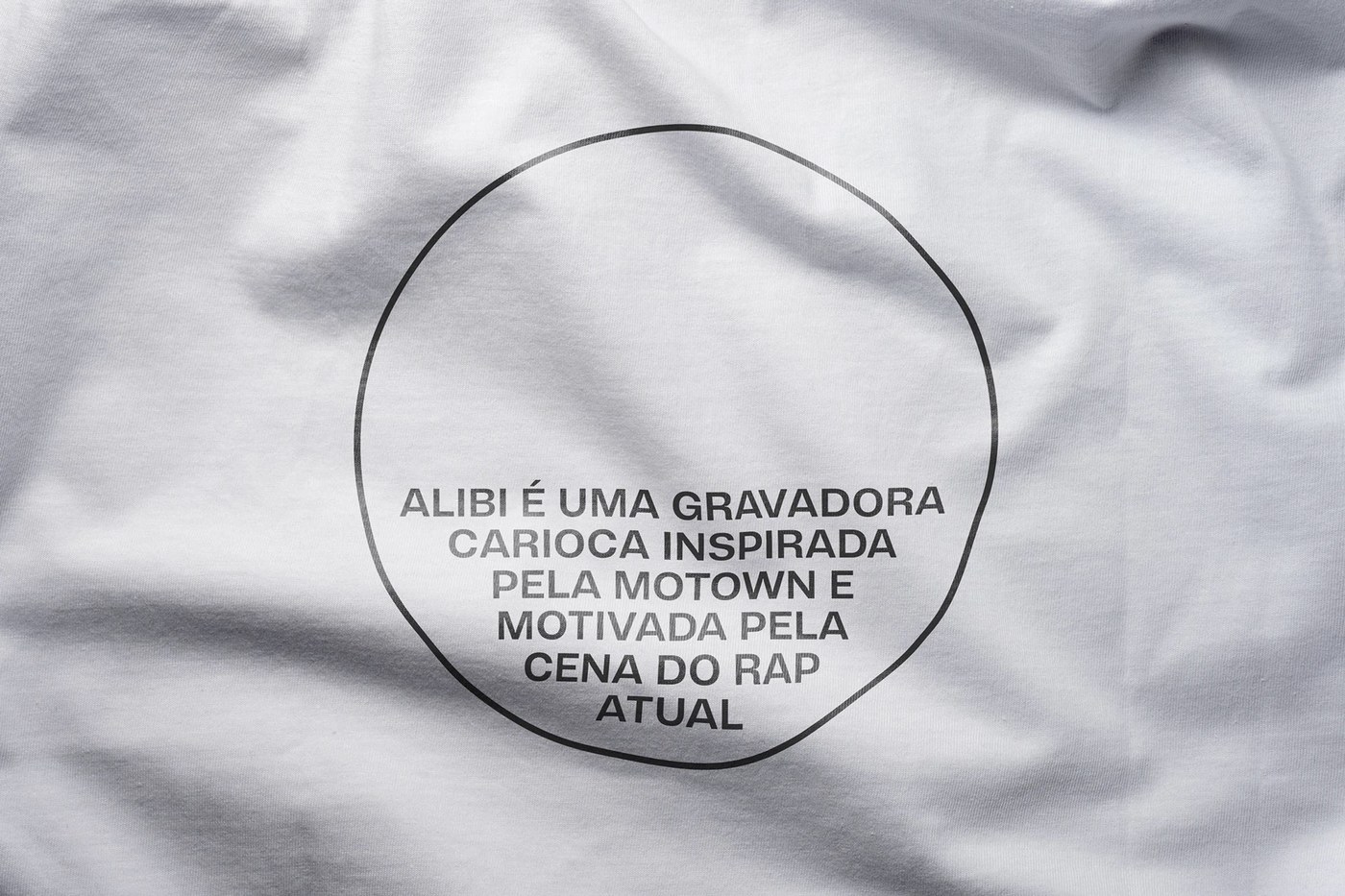 White cotton t-shirt with circular manifesto screenprint celebrating Motown inspiration and Brazilian rap