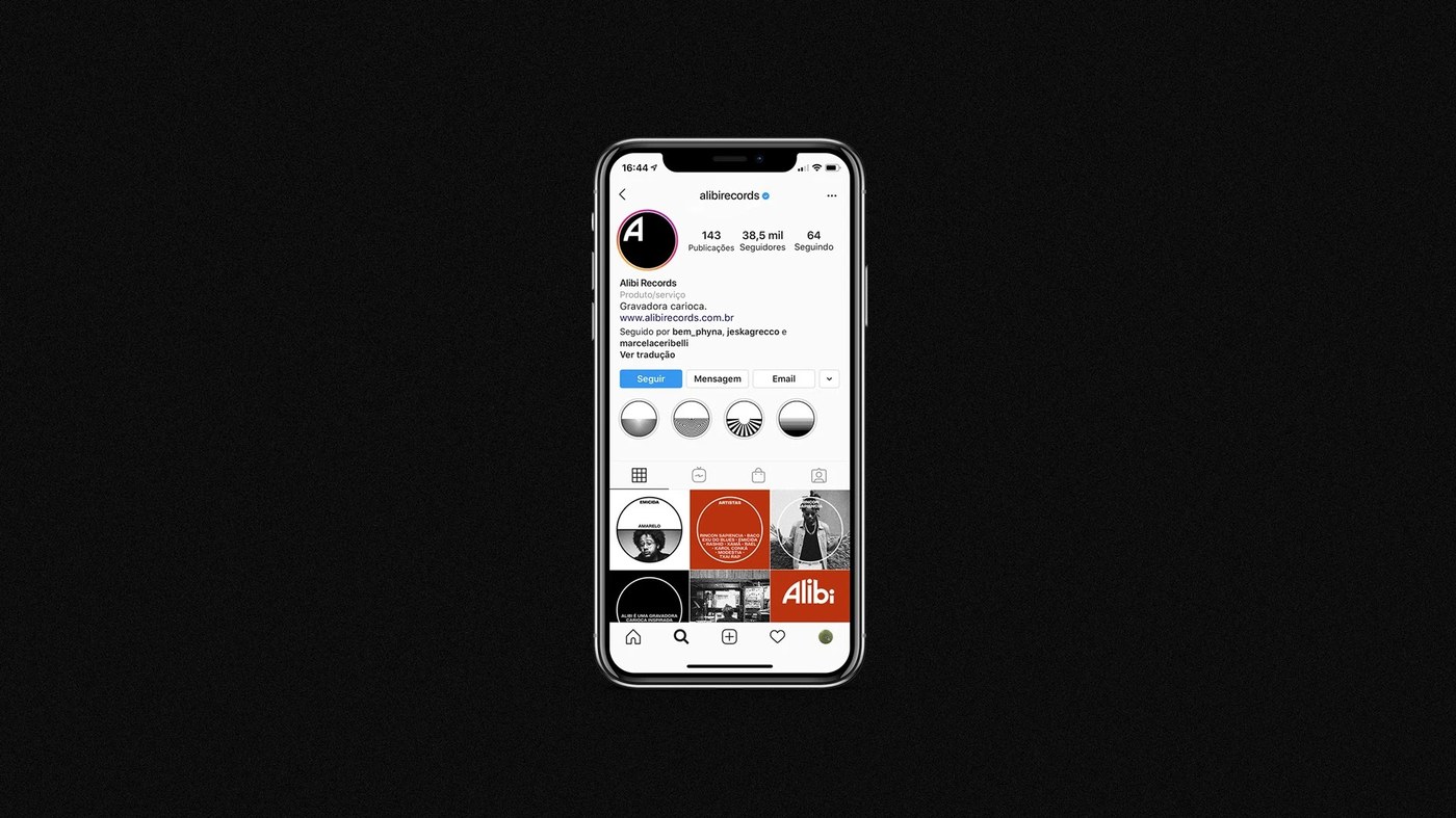 Smartphone interface showcasing Alibi Records social feed, acoustic highlight badges, and album releases