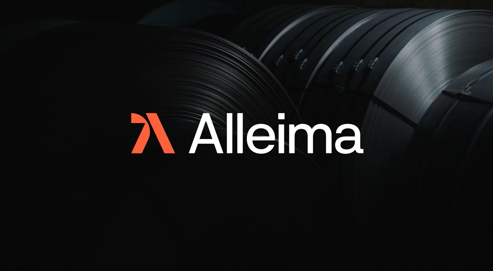 Alleima logotype and Molten Orange A-monogram set over dark rolled steel coils by Kurppa Hosk
