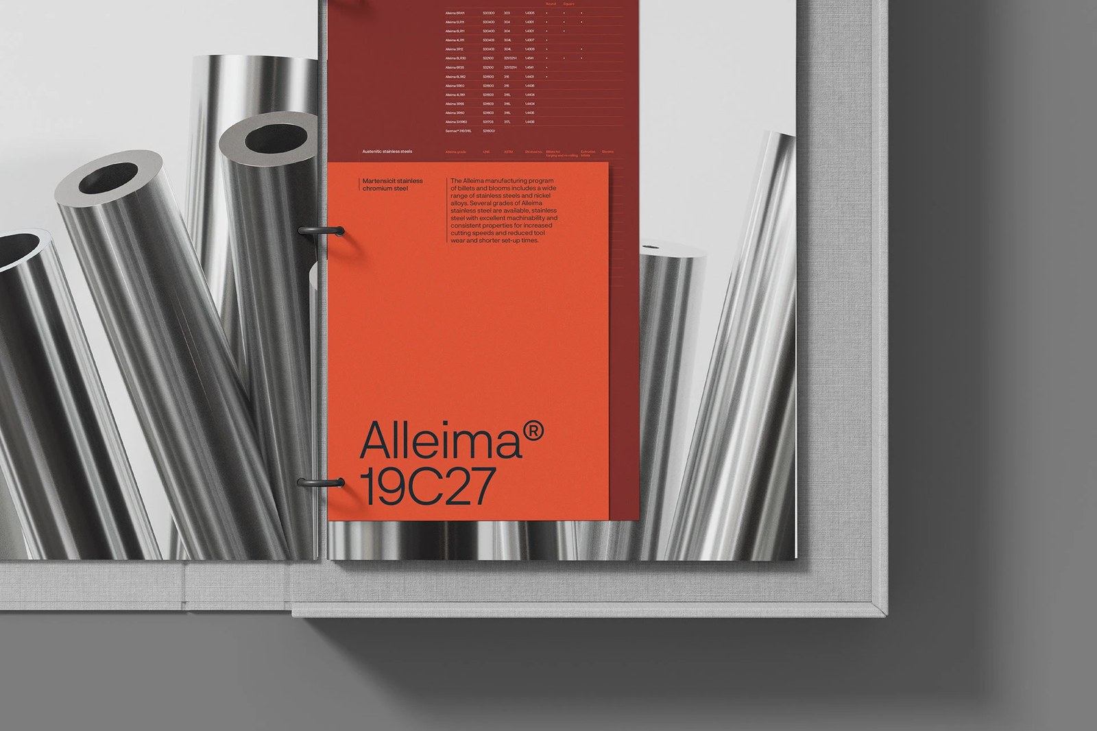 Alleima visual identity ring-bound technical binder showing Molten Orange Alleima 19C27 insert and stainless steel tubes by Kurppa Hosk