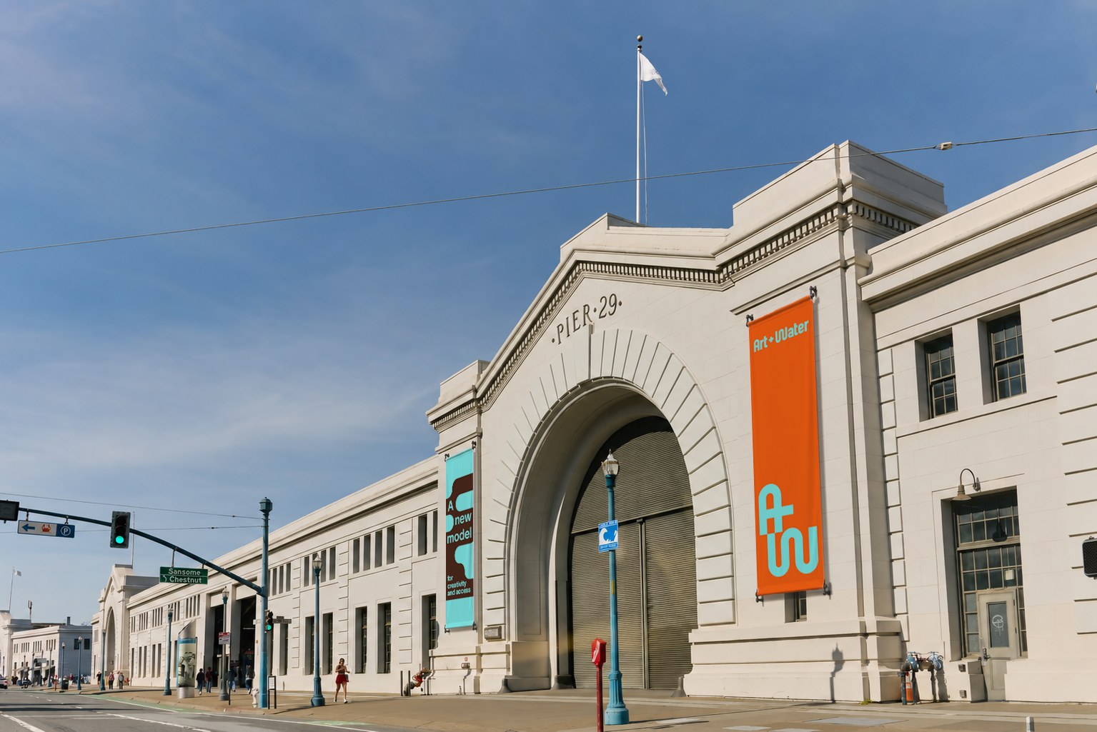 Art + Water brand identity design system Pier 29 architectural entrance and outdoor signage on San Francisco waterfront