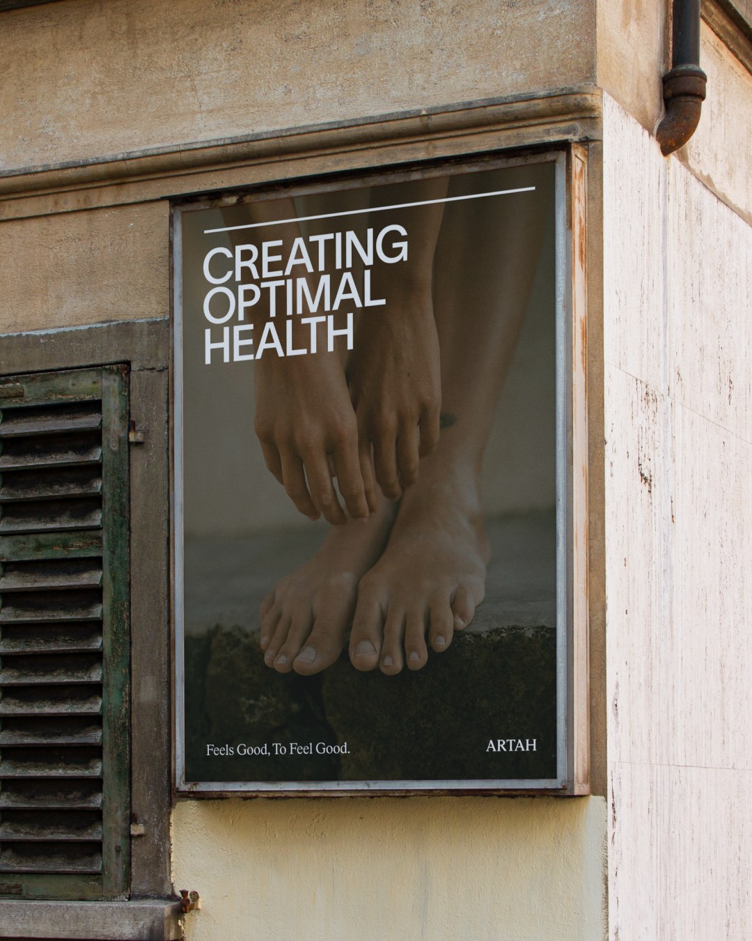Outdoor campaign billboard in metal frame on building facade stating Creating Optimal Health for Artah branding design