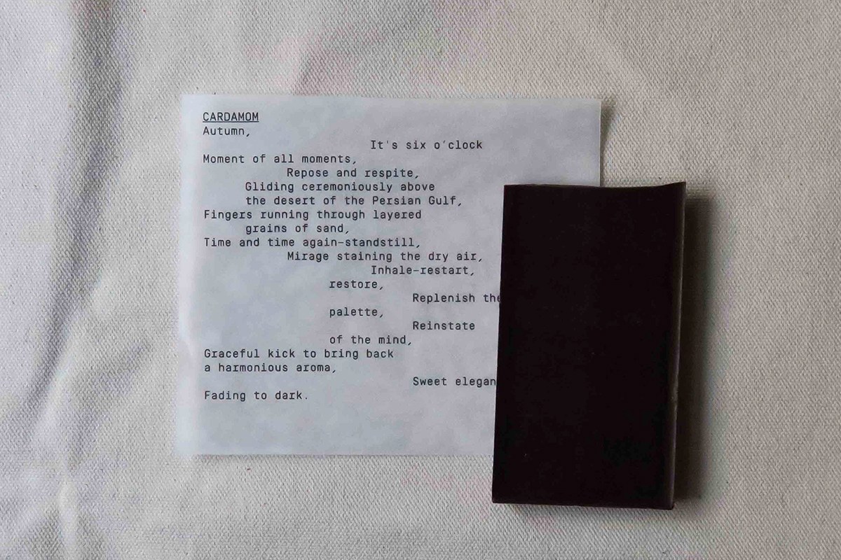 Detail of custom poem sheet on translucent paper for Casa Bosques chocolate packaging design by SAVVY STUDIO