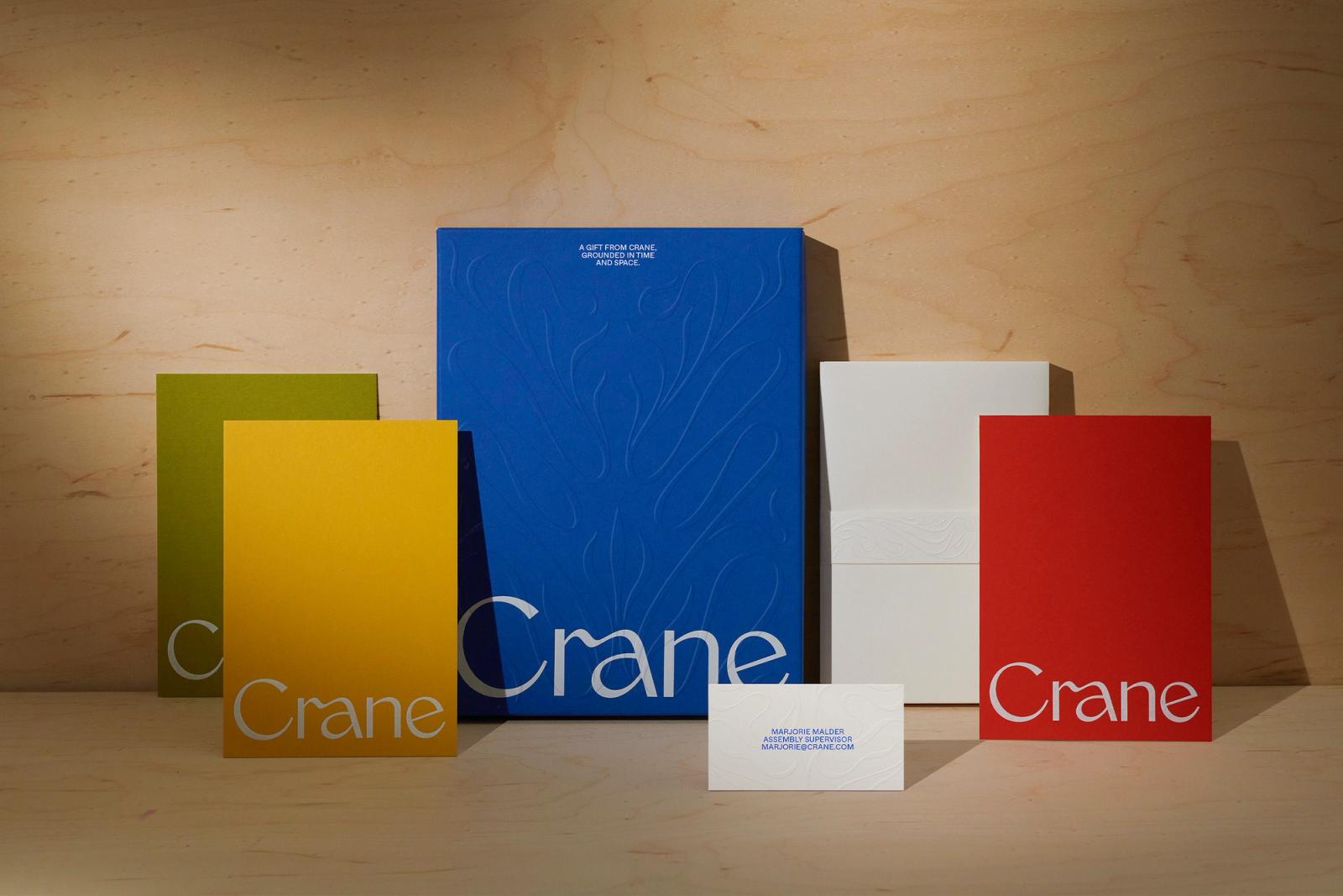 Crane branding and stationery system overview in cobalt blue, saffron yellow, olive green, and crimson red by COLLINS