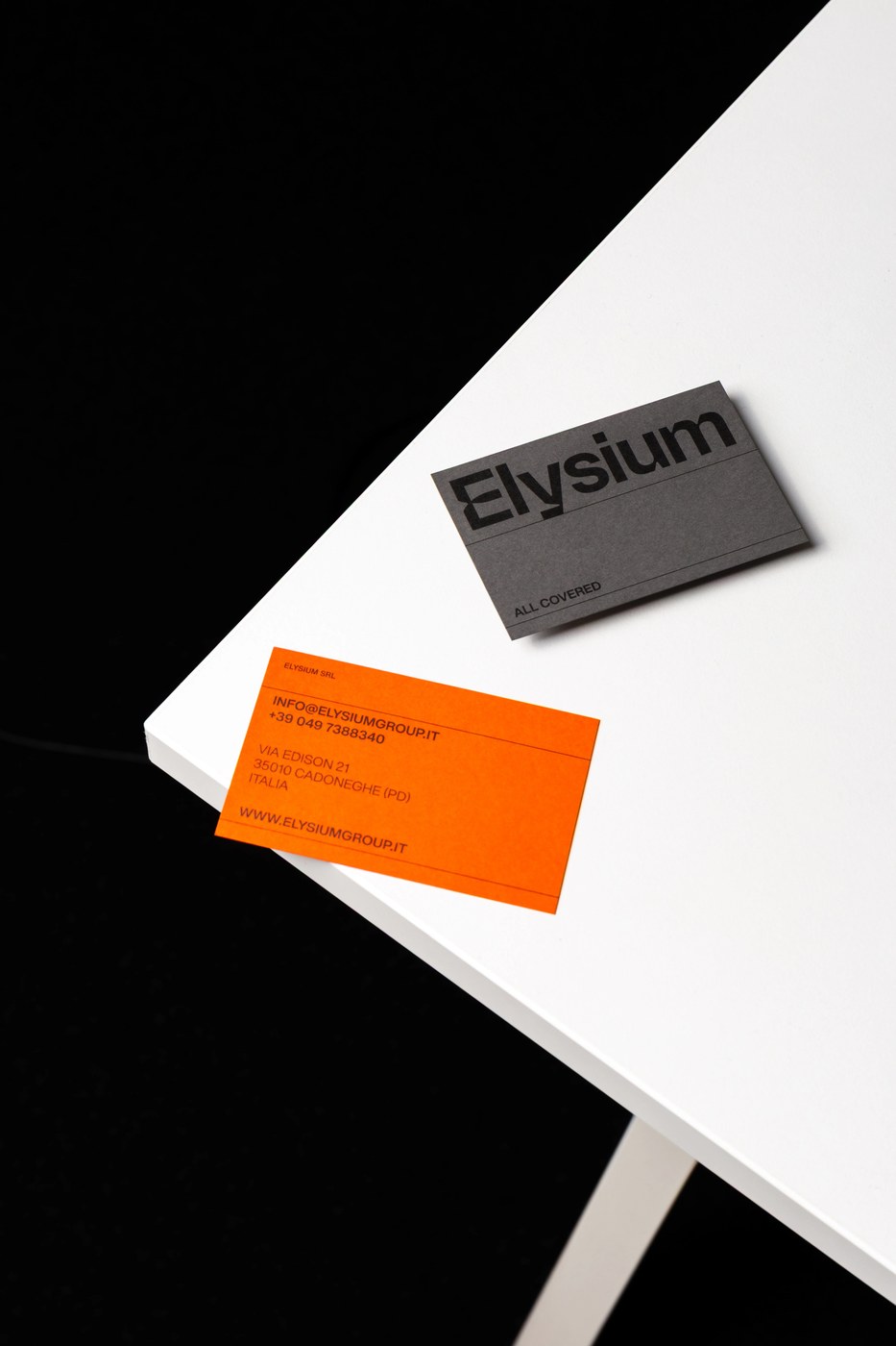 Corporate folder and blind deboss detailing — brand identity design by Another Collective