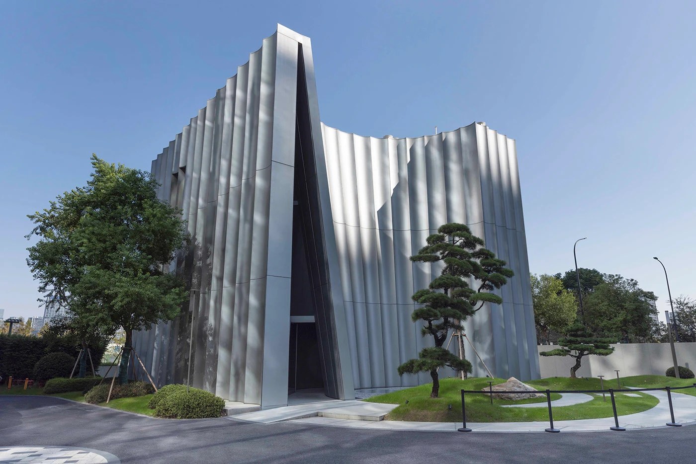 empathy museum branding building exterior corrugated metal facade