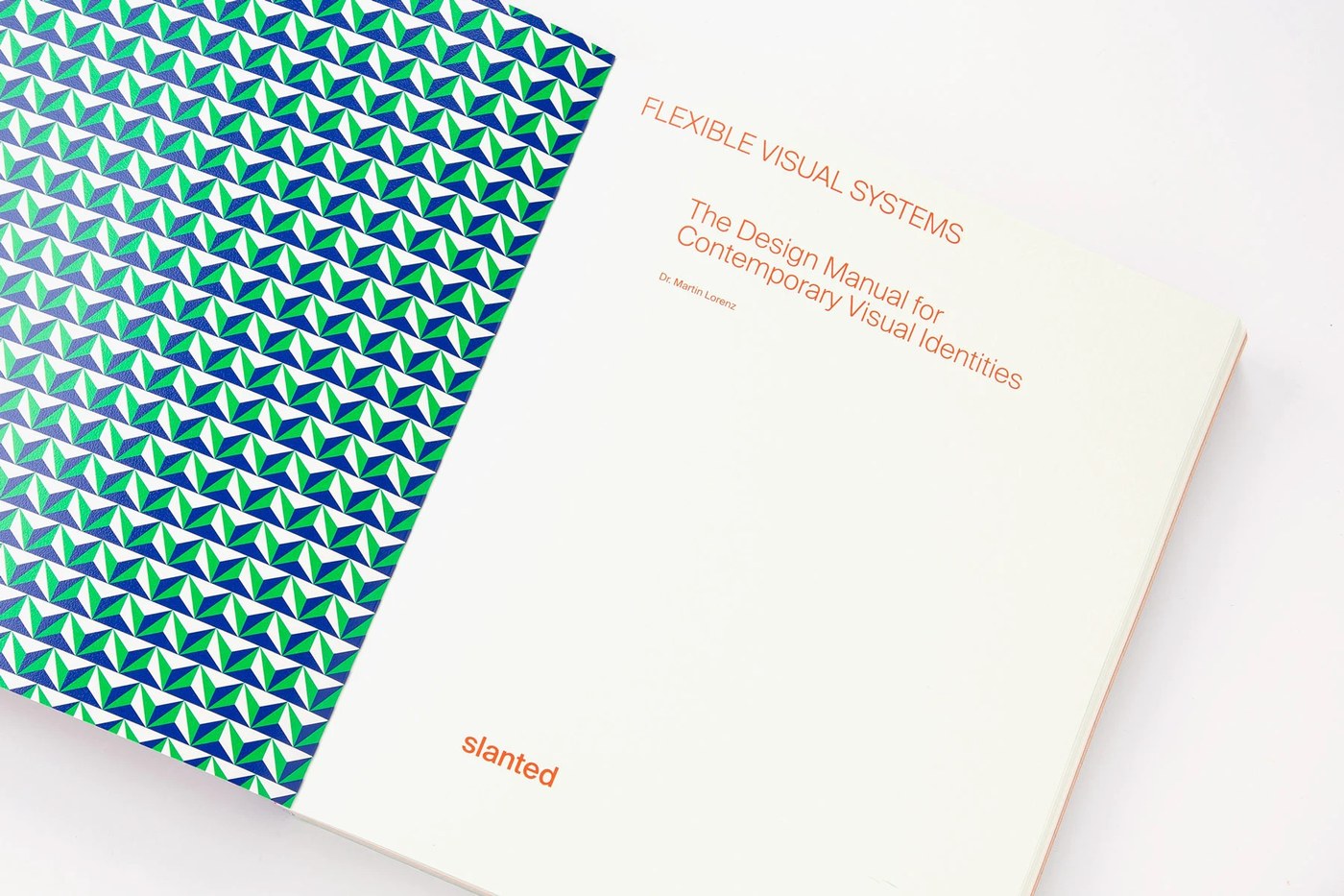 Geometric tessellation endpaper and title page spread — editorial design by TwoPoints.Net