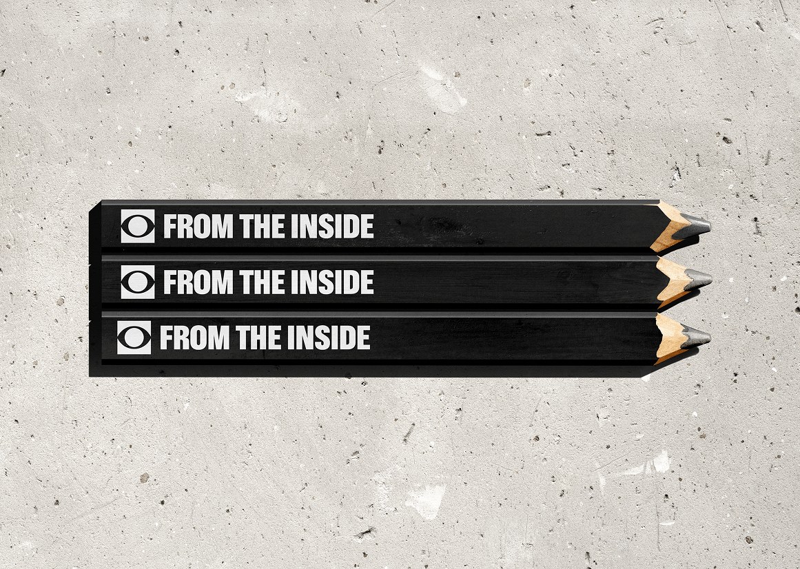 Visual identity black carpenter sketching pencils on raw concrete wall for From The Inside