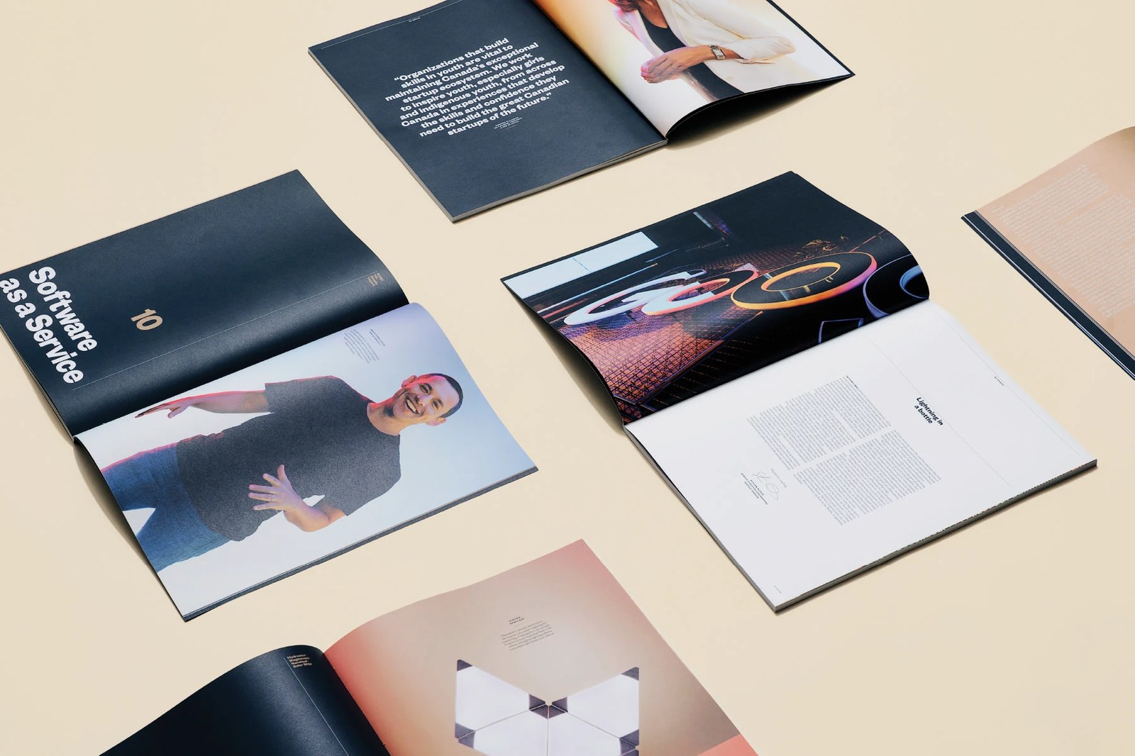 Flat-lay overview of open Google Go North spreads showing black chapter dividers and portraits — editorial design by Underline Studio