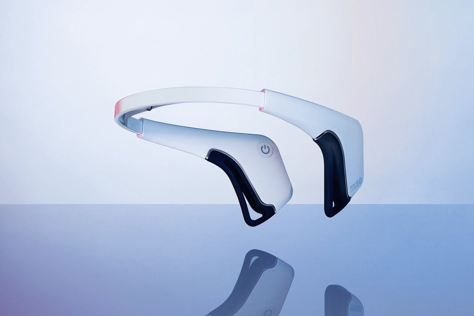 Studio product photograph of Interaxon Muse brain-sensing headband on reflective blue surface — editorial design by Underline Studio