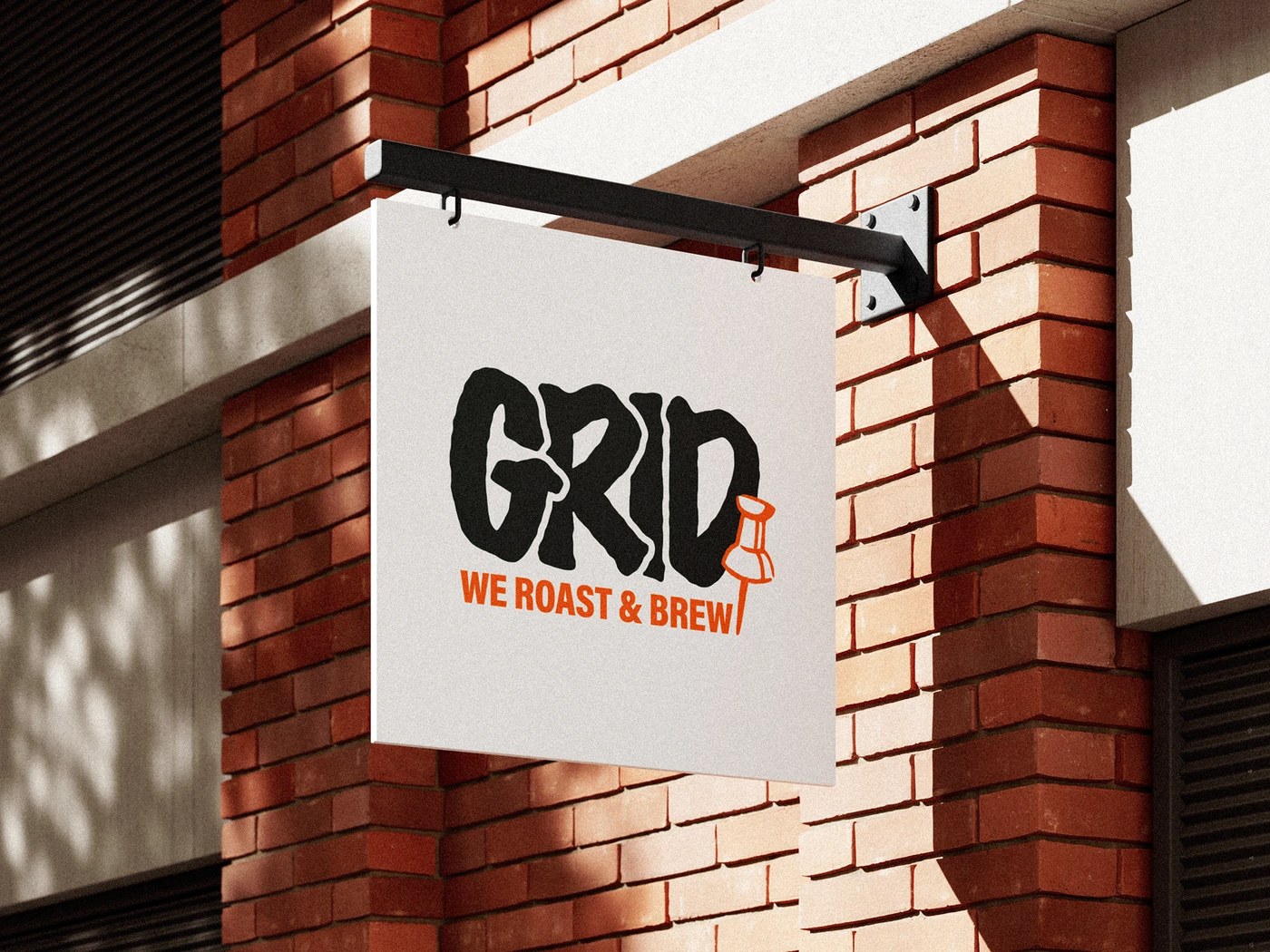 Storefront exterior showing the coffee shop branding visual identity system