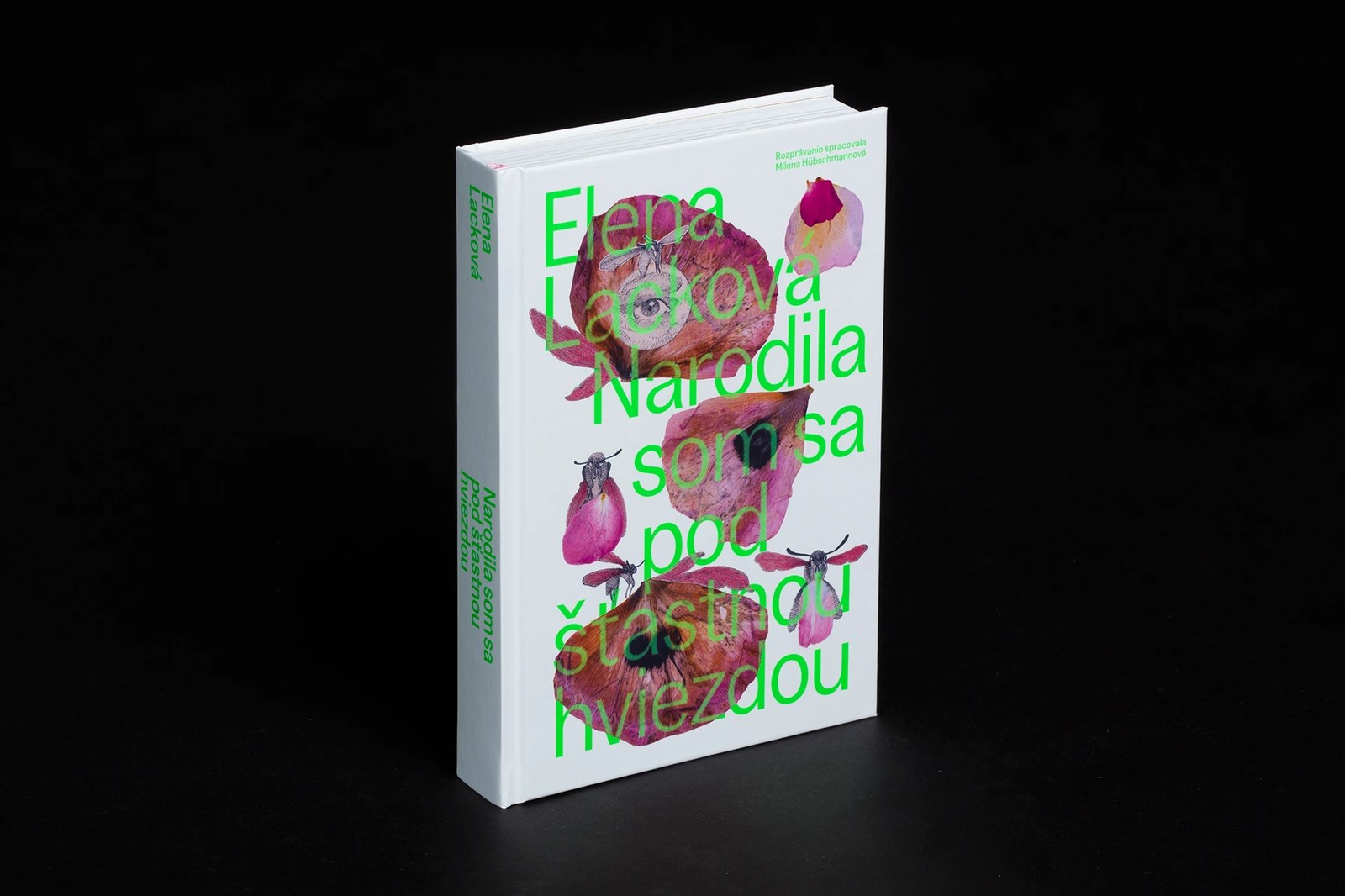 Standing white hardcover book design of Elena Lacková’s I Was Born Under a Lucky Star with Pantone green type over Robert Gabris poppy collage