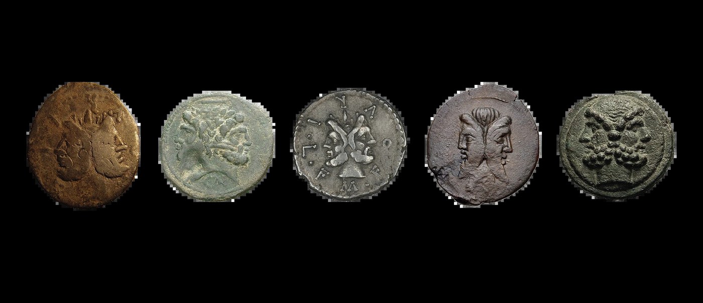 Los detalles de monedas antiguas resaltan el concepto Janus de esta marca de sistema de identidad visual de diseño web.
