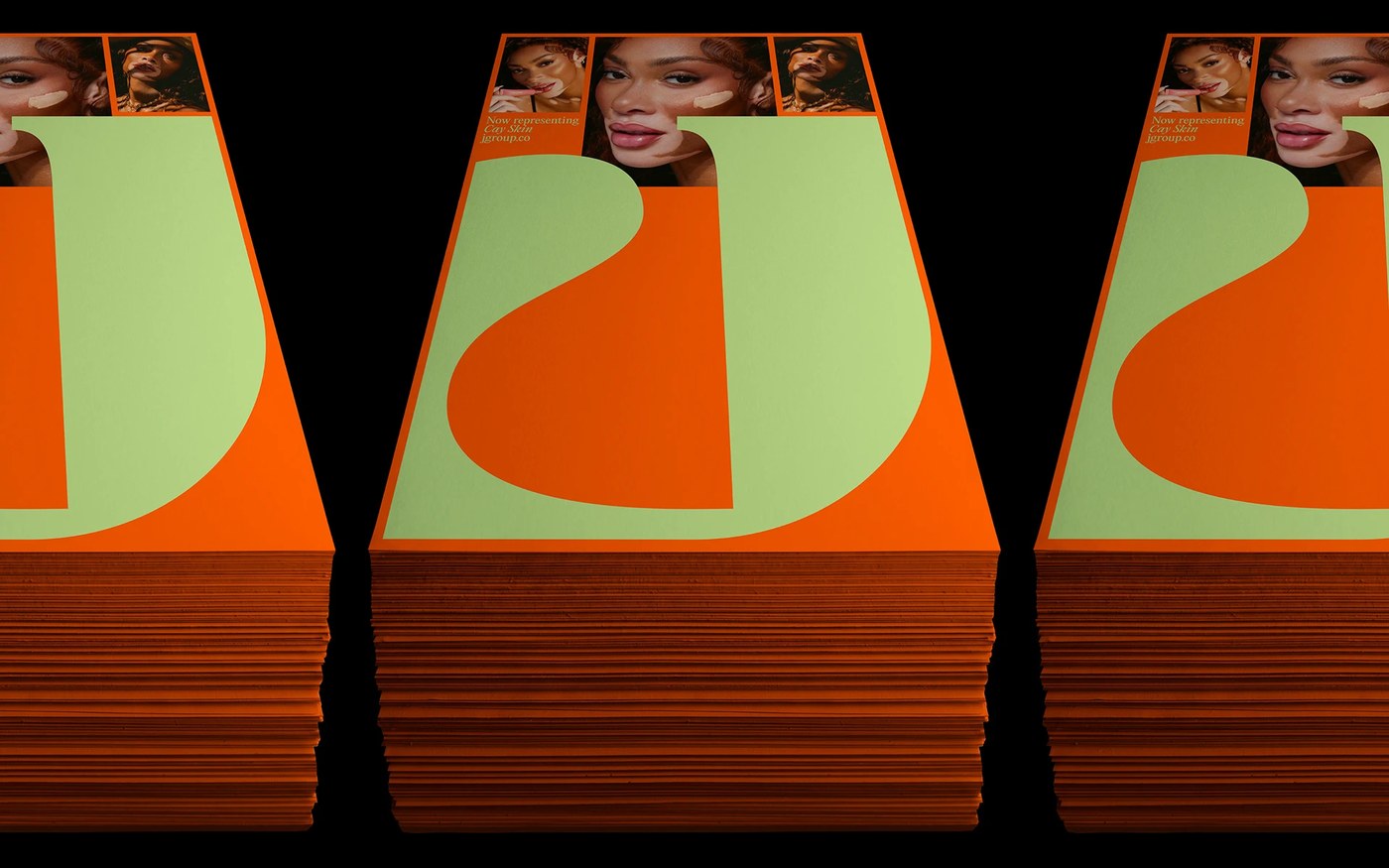 JGroup brand identity edge-colored promotional cards and sculptural J monogram by Rafael Cardoso