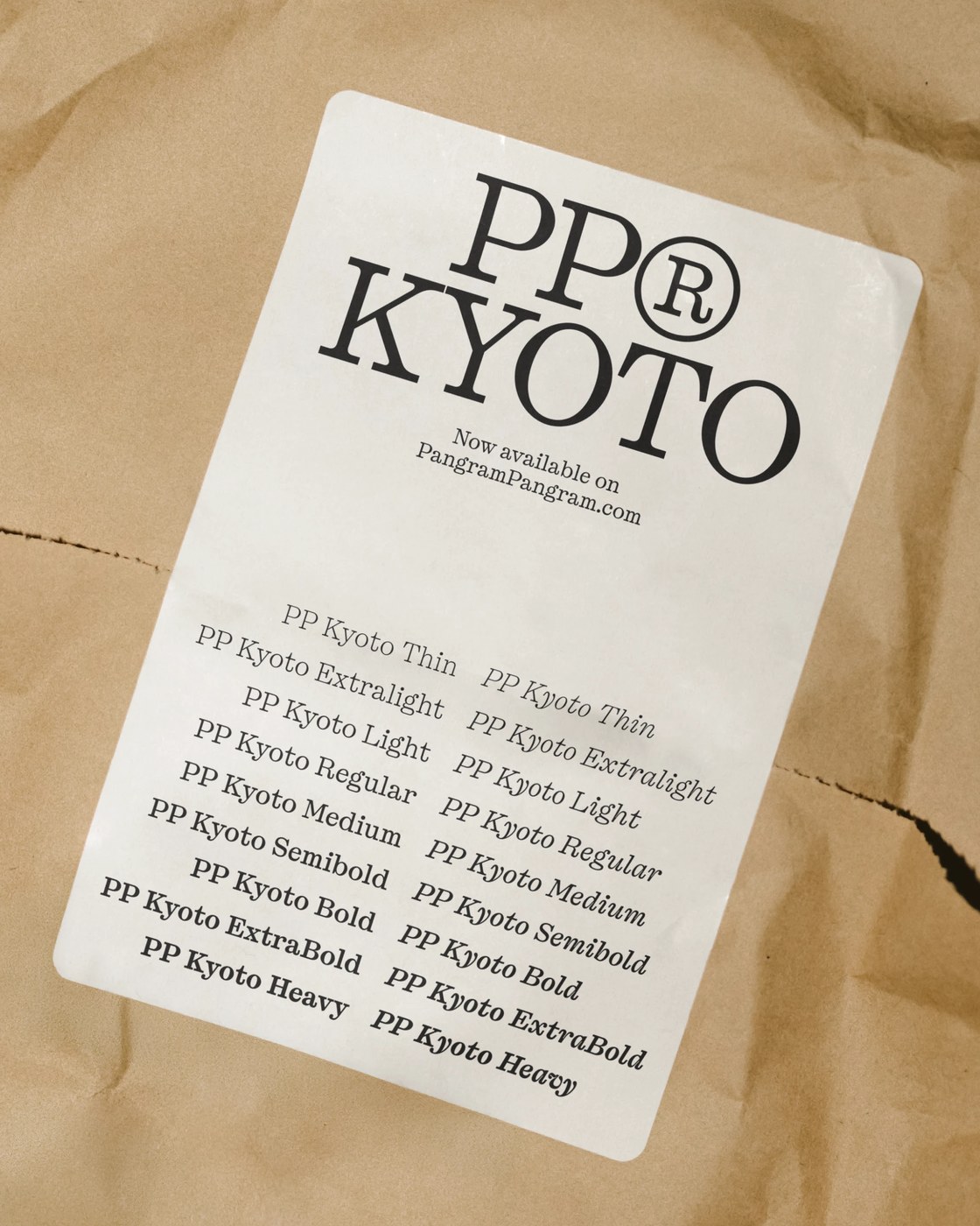 Brown kraft paper packaging with printed label specimen for PP Kyoto typeface design