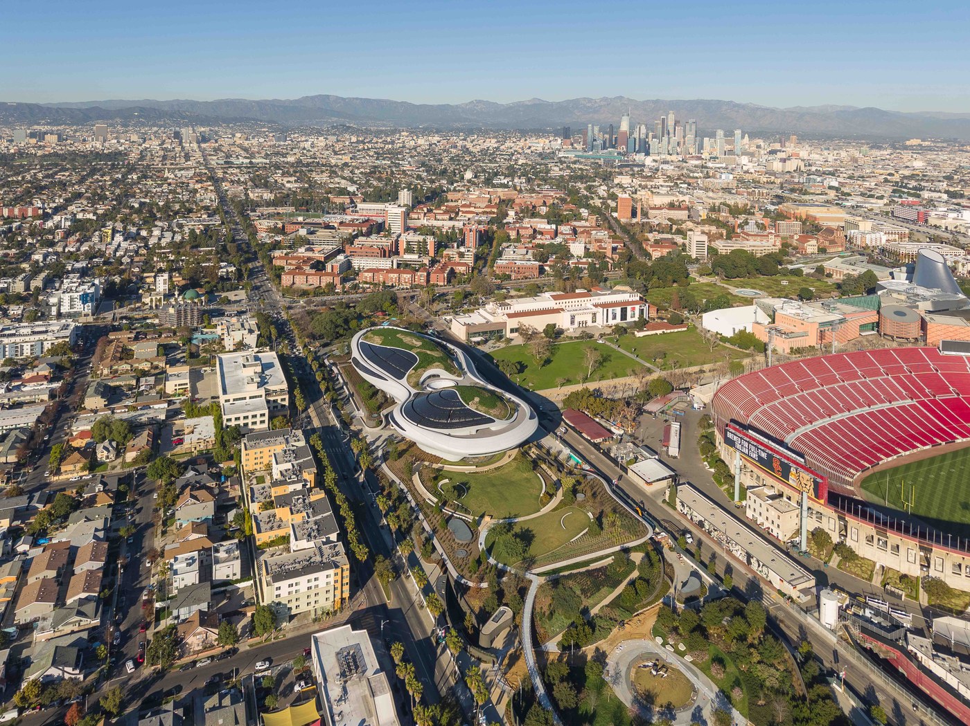 Biomorphic FRP curved facade and Studio-MLA native landscape gardens at the Lucas Museum