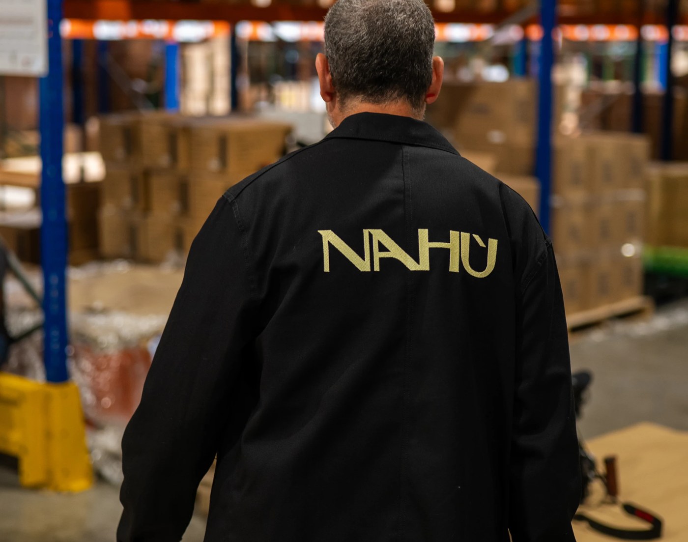 Staff warehouse workwear jacket with embroidered logo — branding design by Brand Brothers