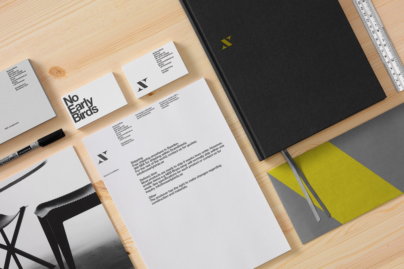 Stationery suite and cloth notebook in No Early Birds branding design by Kurppa Hosk