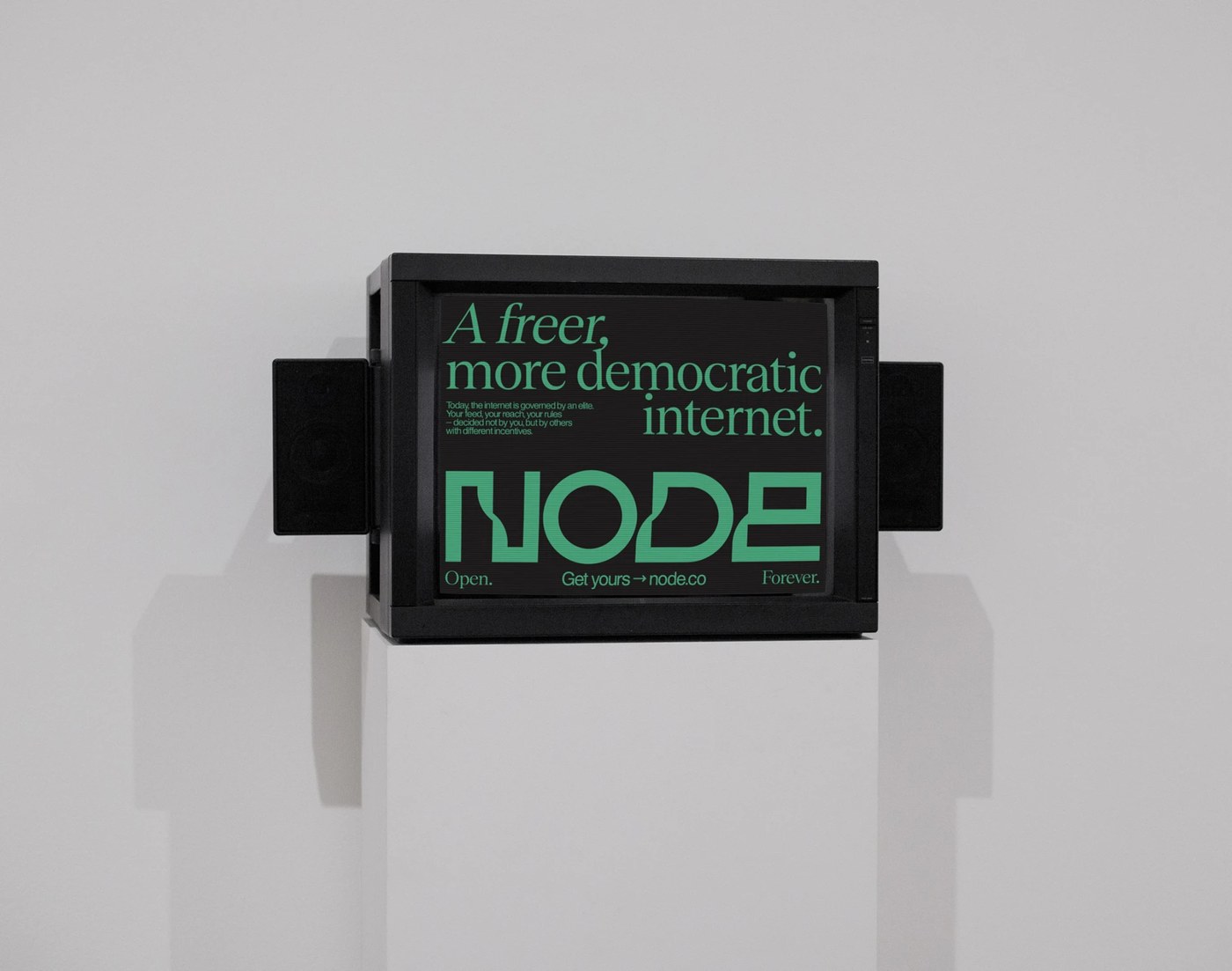 Vintage CRT monitor installation displaying Node brand identity manifesto