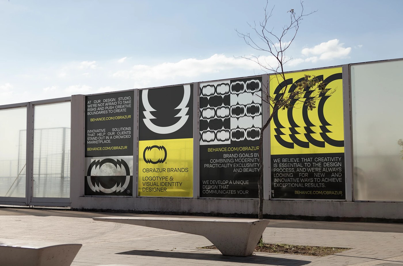 Outdoor urban poster system displaying serrated glyph iterations and Swiss typography