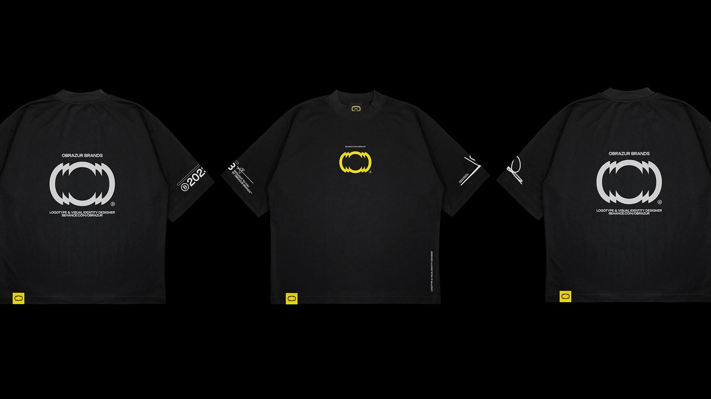 Heavyweight black cotton apparel with studio logo and yellow hem tags