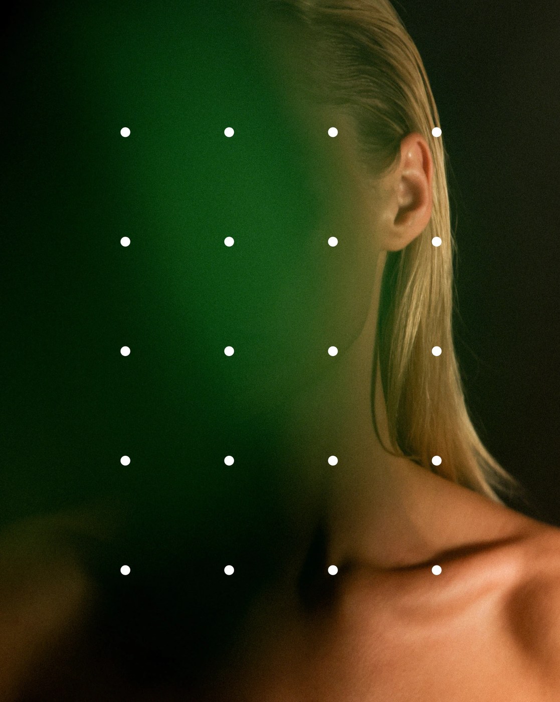 Portrait photography with emerald blur gradient and dot matrix grid in editorial design by Two Times Elliott