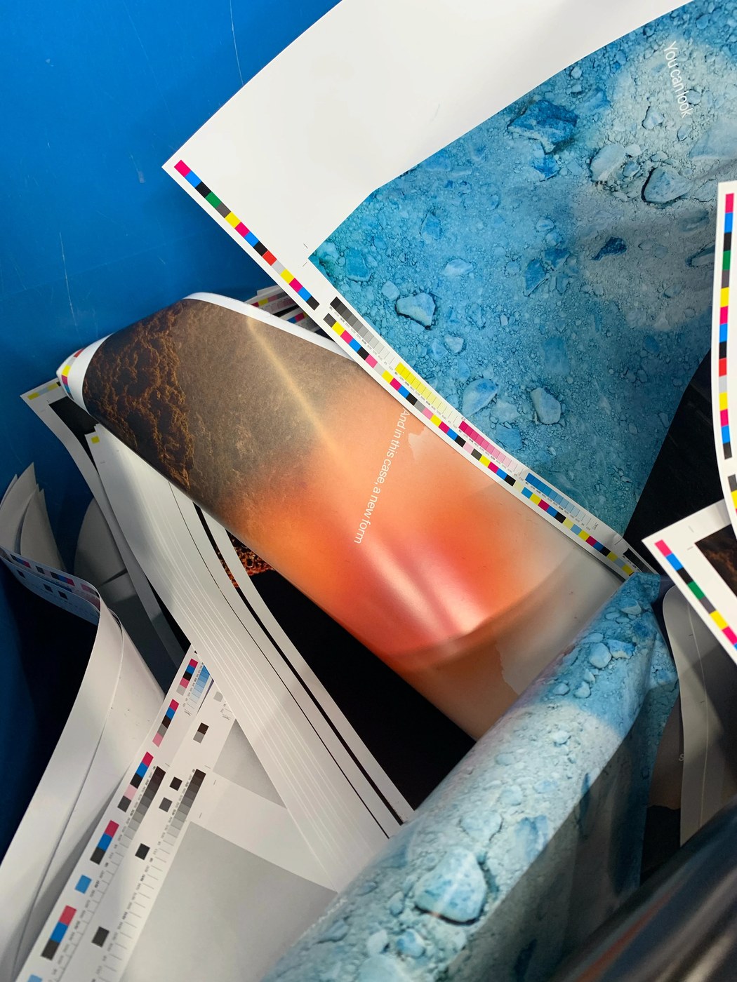 Discarded make-ready sheets in print shop recycling bin repurposed for poster design series