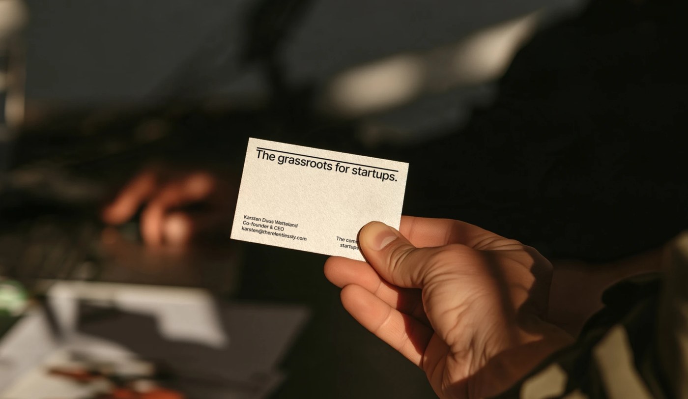 Textured cream business card for Relentlessly Co-founder & CEO Karsten Duus Wetteland with overline headline