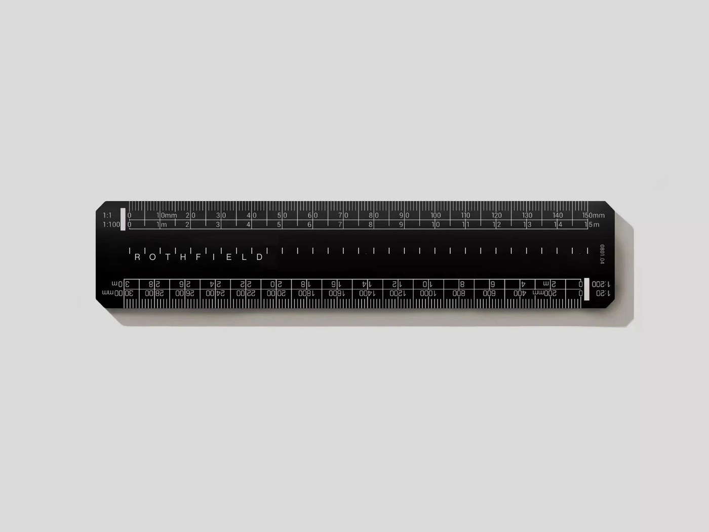 Custom black anodized architectural scale ruler with 1:100 millimeter markings and Rothfield calibration wordmark