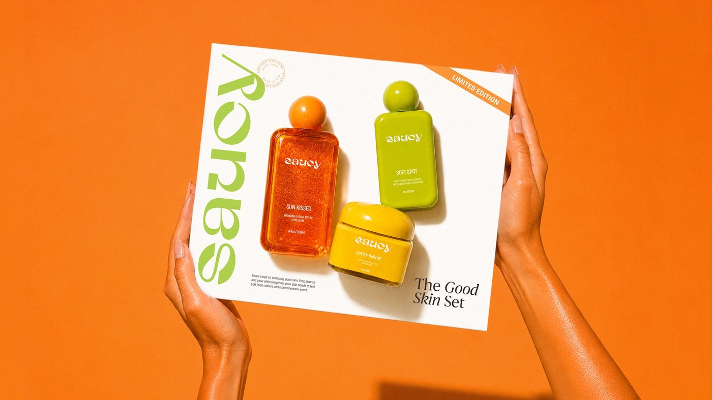Saucy packaging design product lineup on studio surface by Nathalia Ultramar