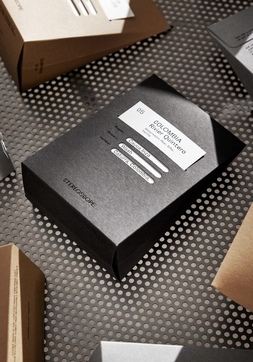 Stereoscope Coffee packaging design boxes in seasonal colorways with Bagua trigram cut-outs by OlssønBarbieri