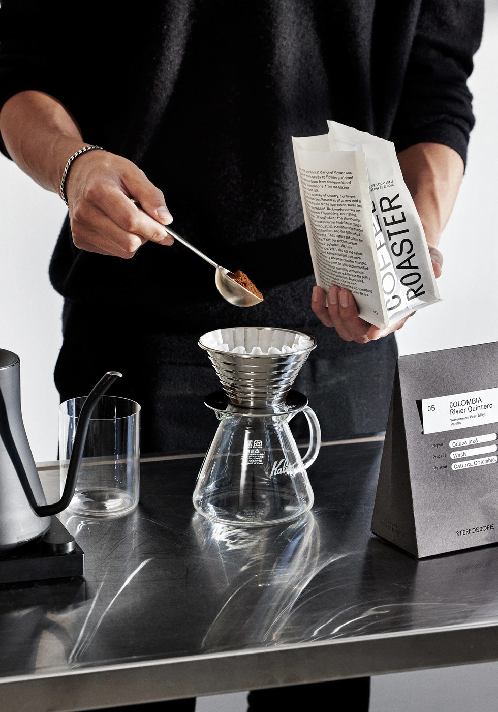 Bespoke tear-off opening ritual on Stereoscope Coffee paperboard packaging design by OlssønBarbieri