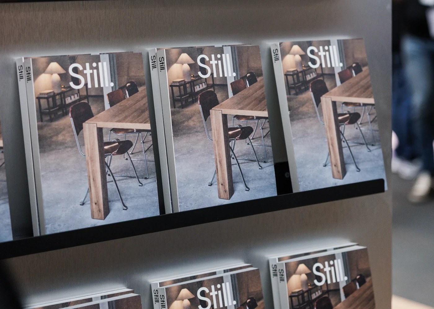 Double page spread layout demonstrating asymmetrical Swiss grid in Still Magazine editorial design