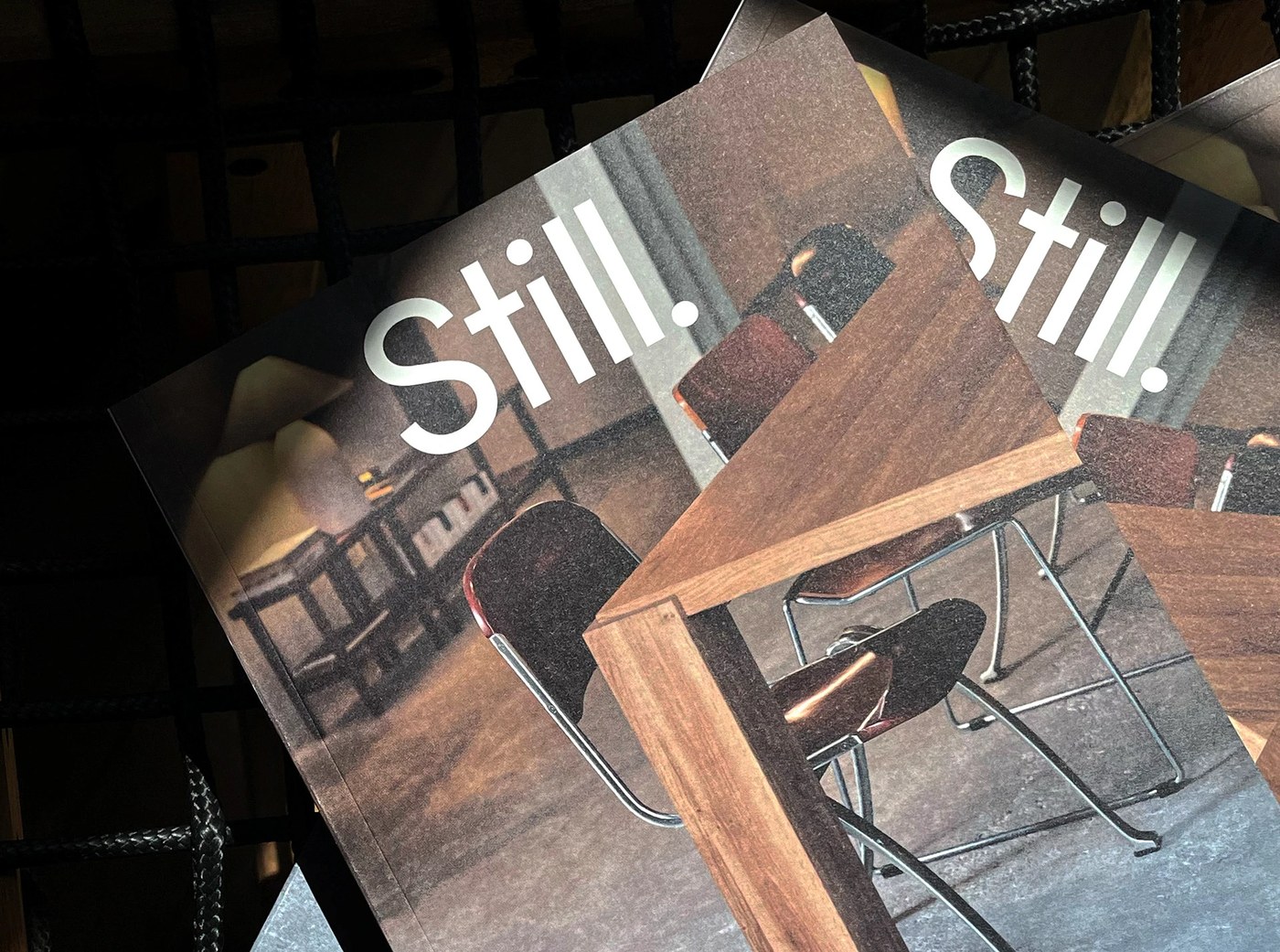 Editorial design book showcase displaying lay-flat binding and Fedrigoni cover stock for Still Magazine