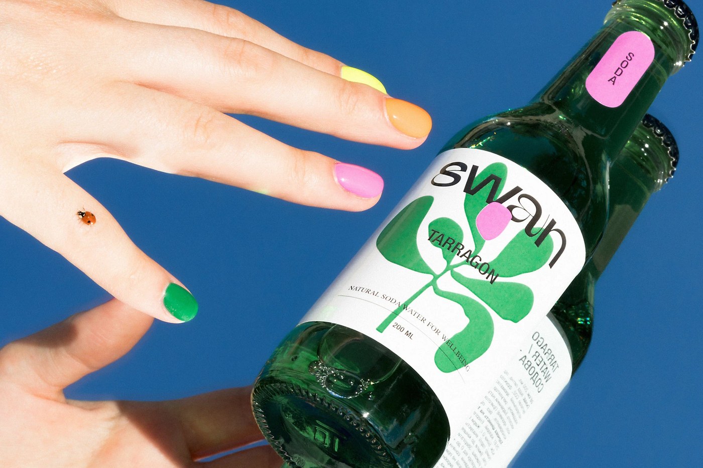 Swan soda packaging design composition by Orchidea Agency