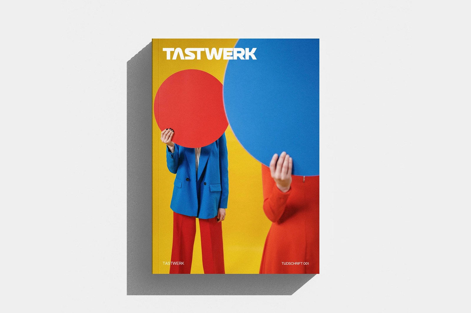 TASTWERK Tijdschrift 001 front cover editorial design by Wessam Hussien featuring the custom geometric wordmark, color palette, and print texture