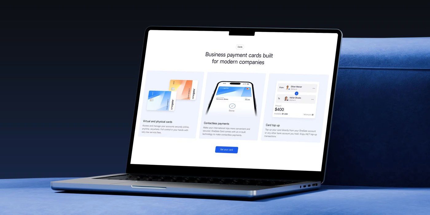 MacBook Pro display showcasing The OneGate responsive web application and digital card management dashboard