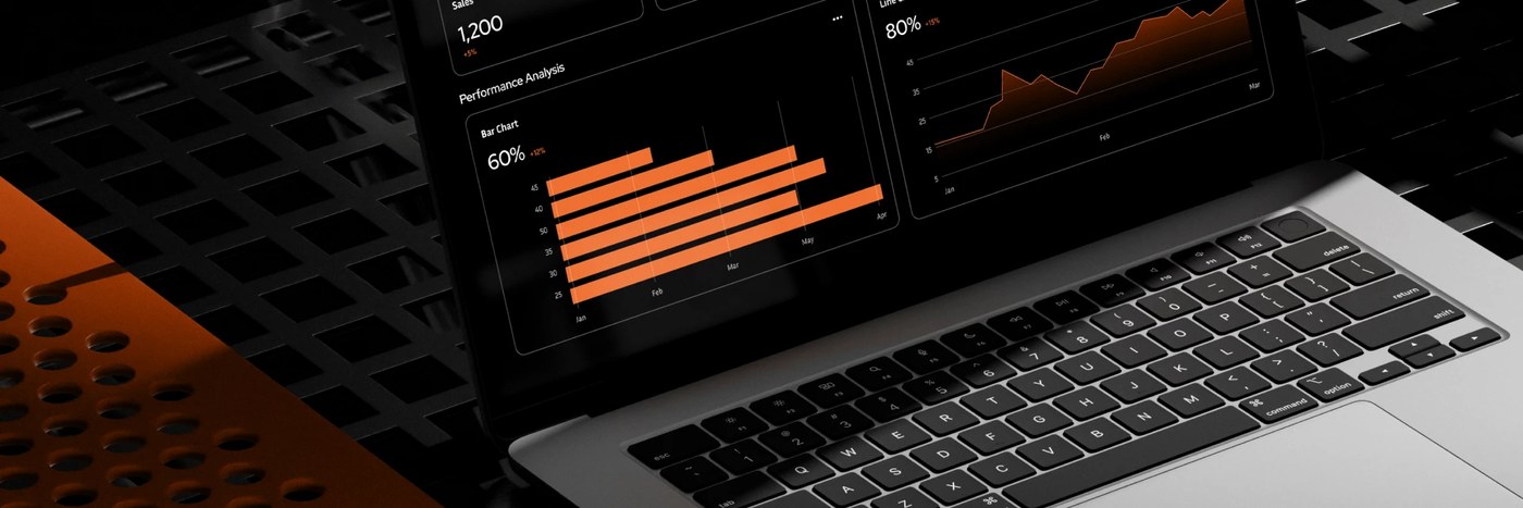 Uncommon brand identity dark mode analytics dashboard on laptop with custom perforated orange stand