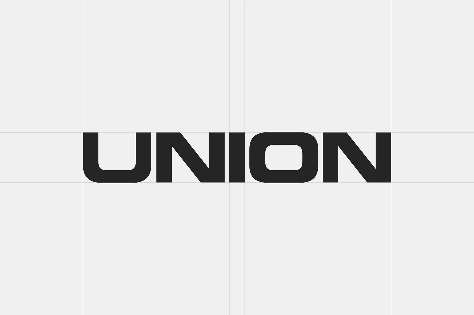 Union extended grotesk logotype locked to its baseline and column grid in the visual identity by Two Times Elliott