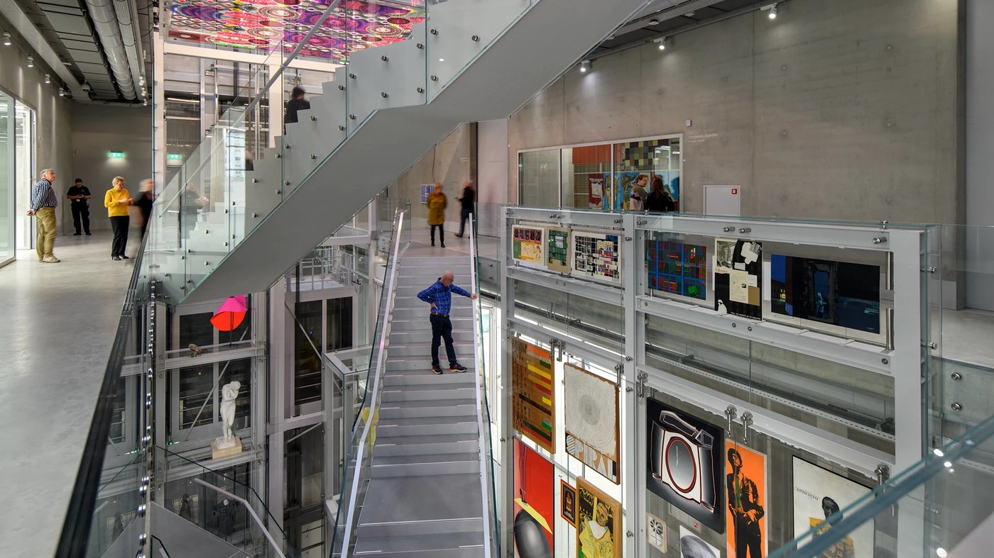 Depot Boijmans central atrium with crisscrossing stairs framing the spatial design by Silo