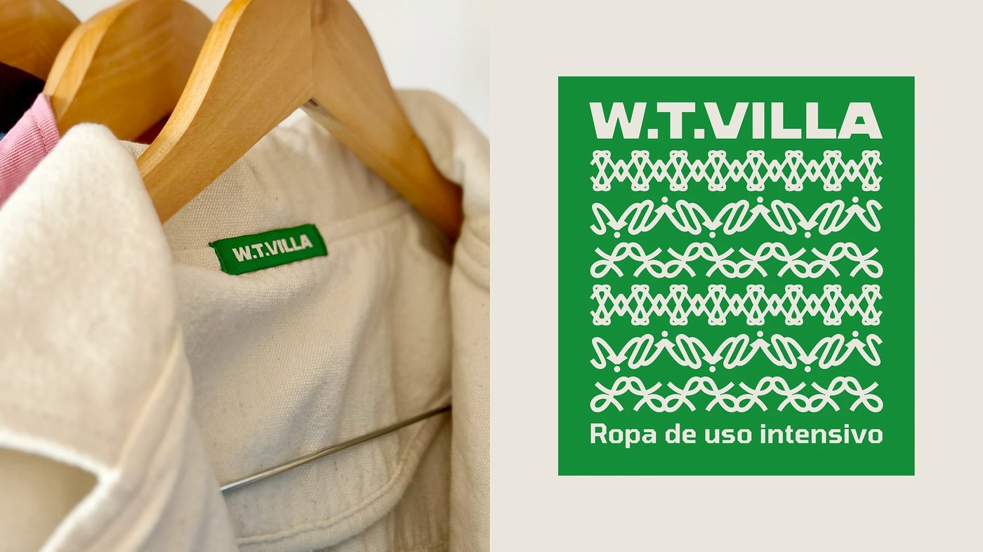 Woven garment tags and typography details on white canvas workwear